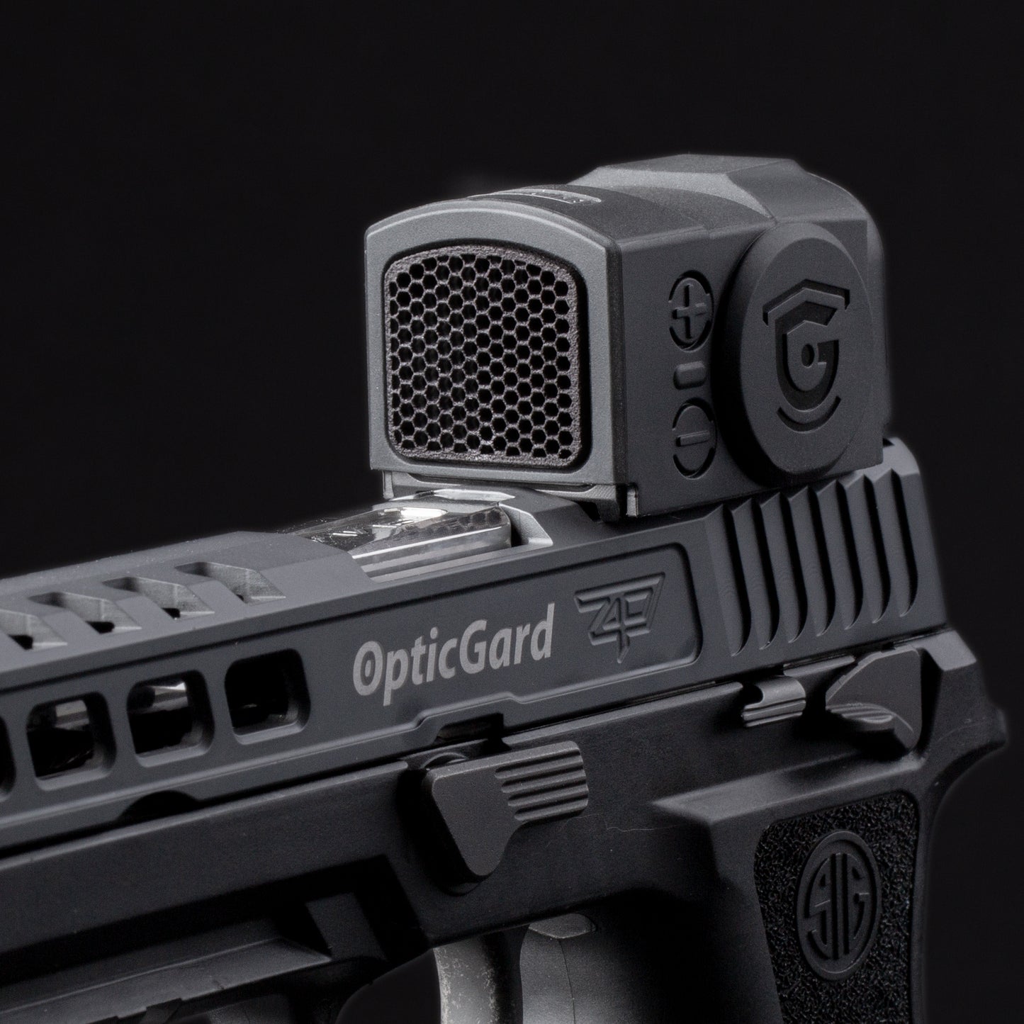 Black Optic Scope Cover with GlareGard Killflash Lens Installed for Aimpoint® ACRO P-2 - Side profile pointing to the left