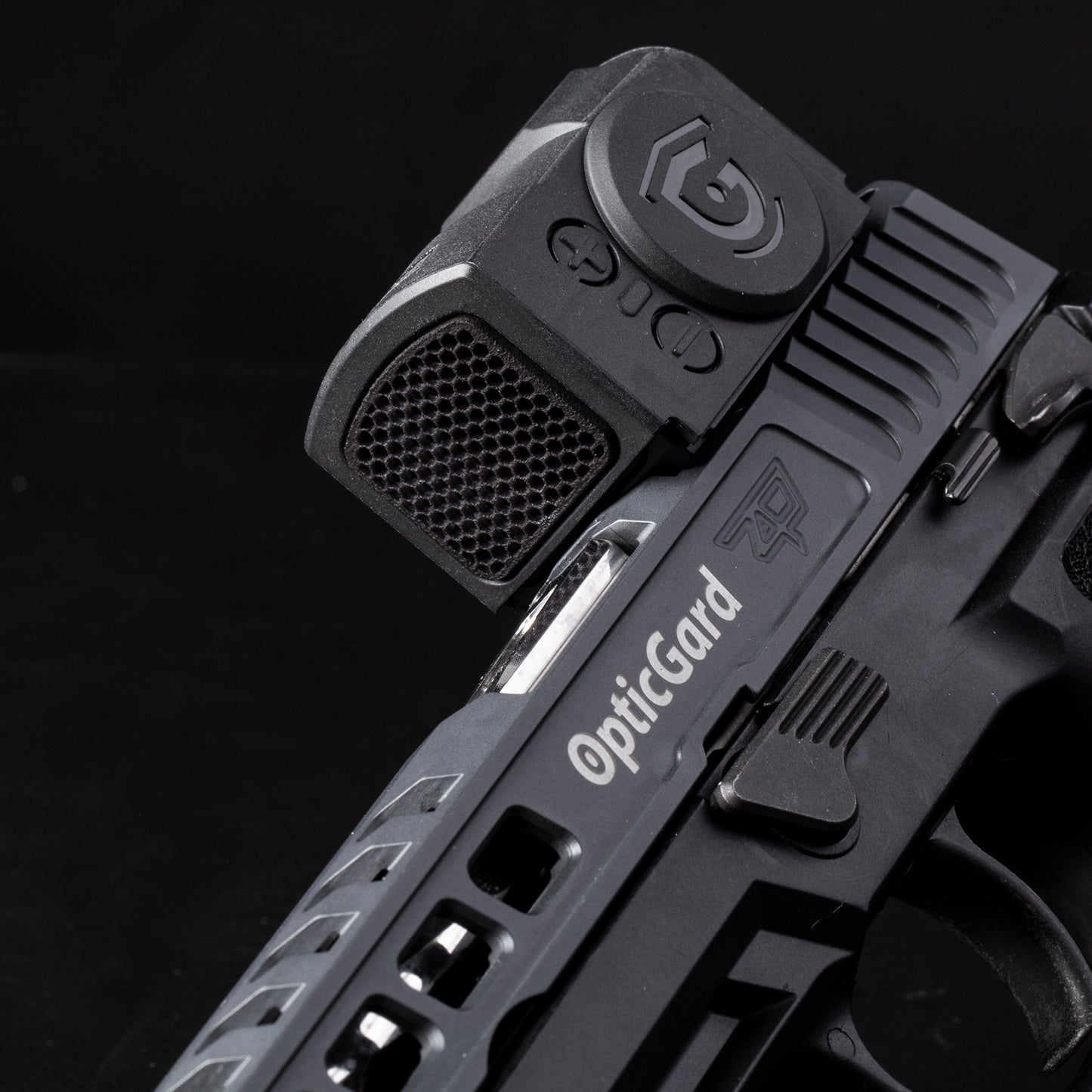 Black Optic Scope Cover with GlareGard Killflash Lens Installed for Aimpoint® ACRO P-2 - Tilted to the left