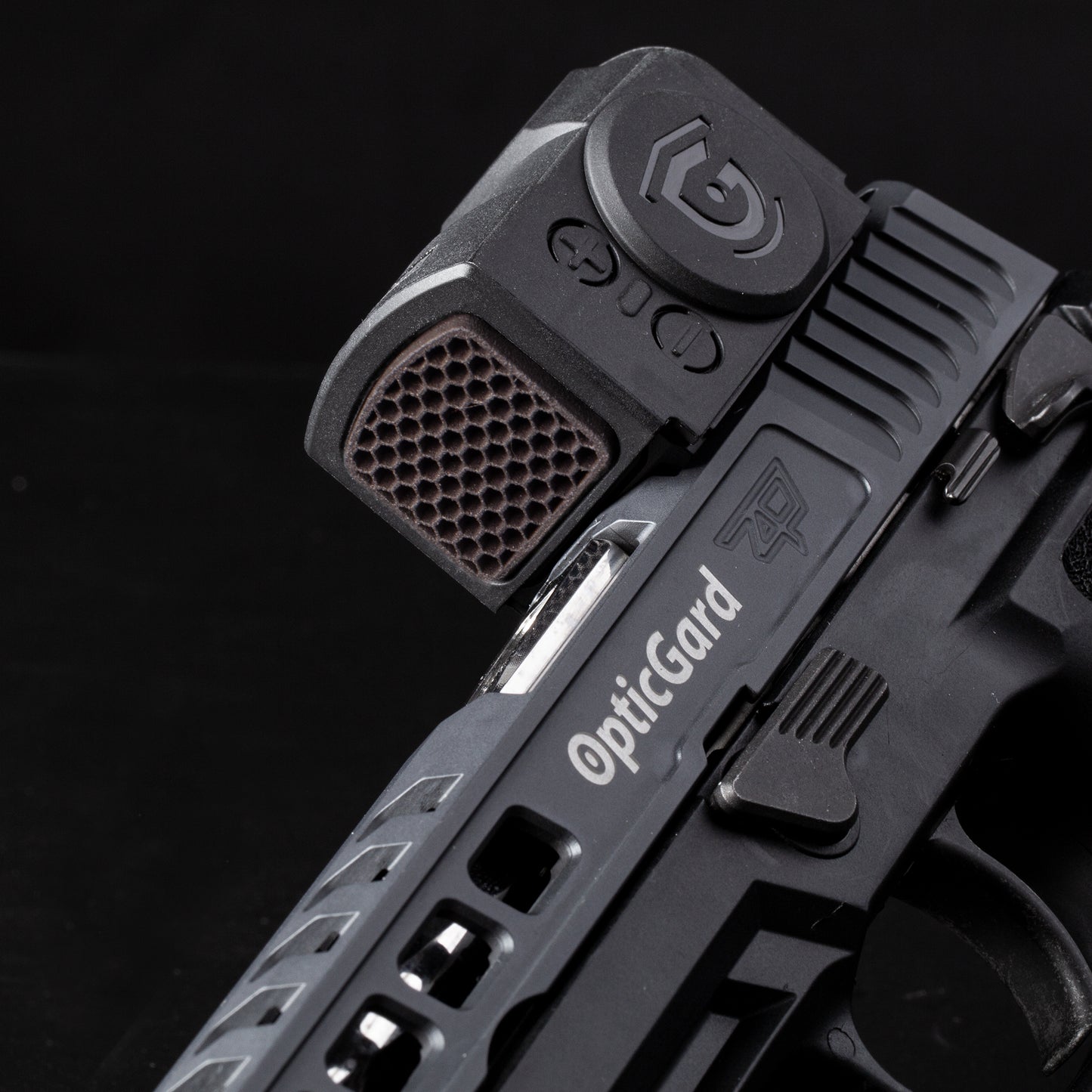 Black Optic Scope Cover with GlareGard Killflash Lens Installed for Aimpoint® ACRO P-2 - Tilted to the left