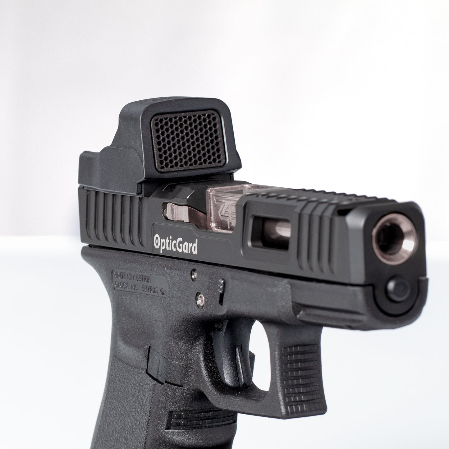 Black Optic Scope Cover with GlareGard Killflash Lens Installed for Eotech® EFLX - Pointing to the right