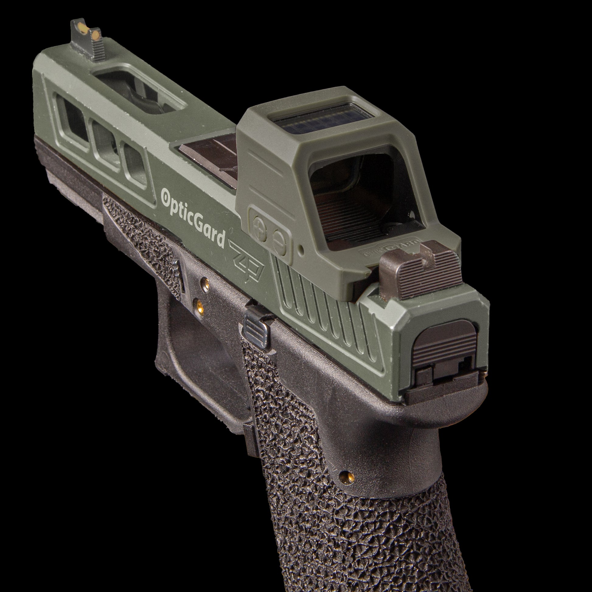 A semi-automatic handgun with an OpticGard Cover for Holosun 507CX3 on top, shown against a solid black background. [ads-hide]