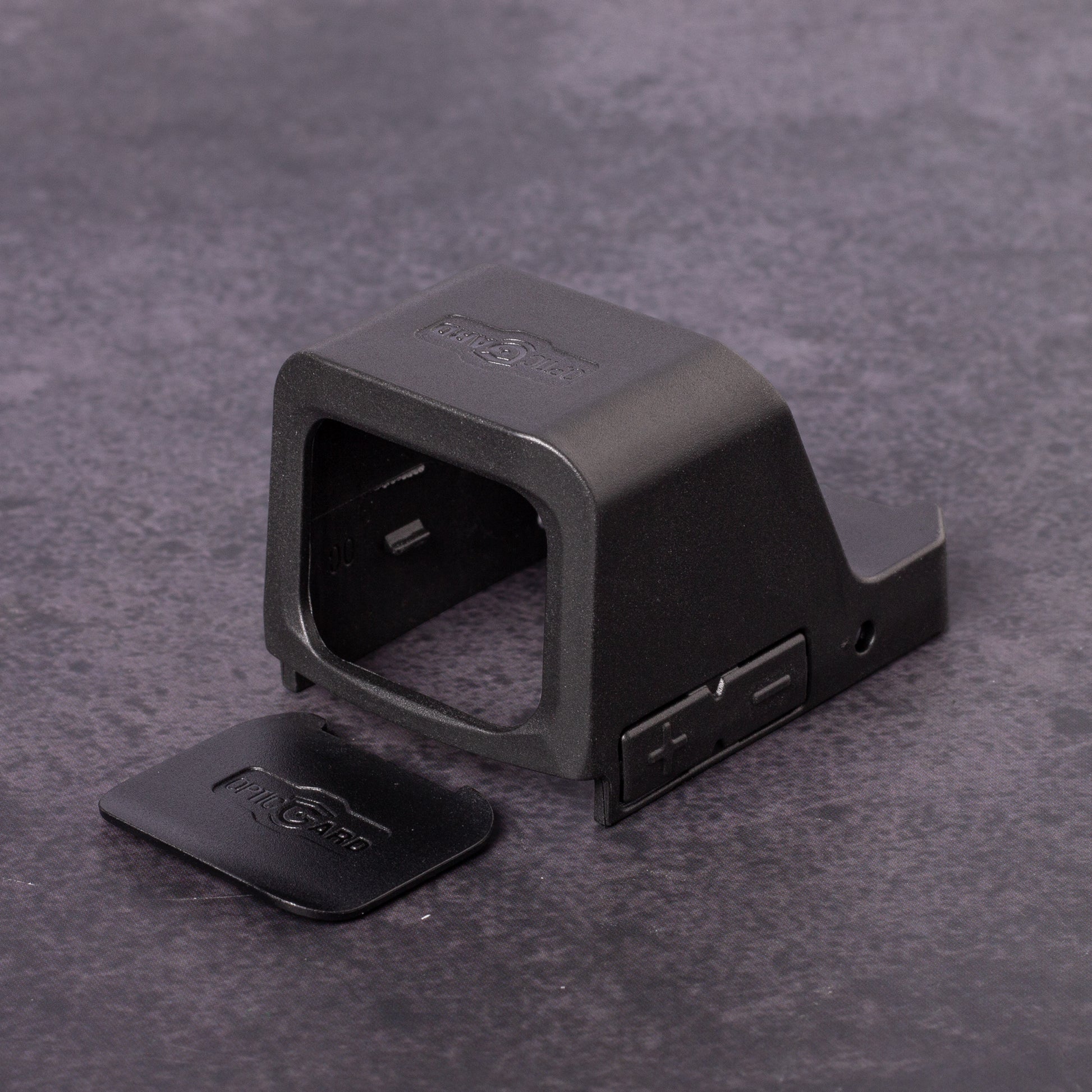 Black OpticGard Cover for Osight C on a gray textured background