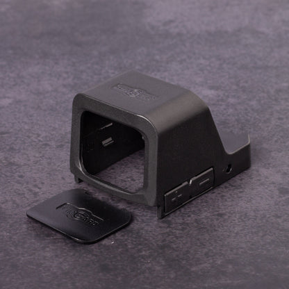 Black OpticGard Cover for Osight C on a gray textured background